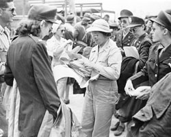 Lieut. Colonel Nola G. Forrest distributes orders